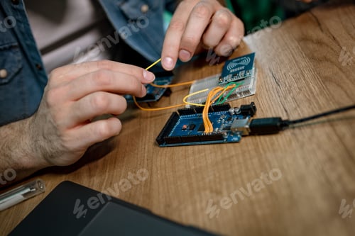 Preview: Engineer Working On Circuit Board