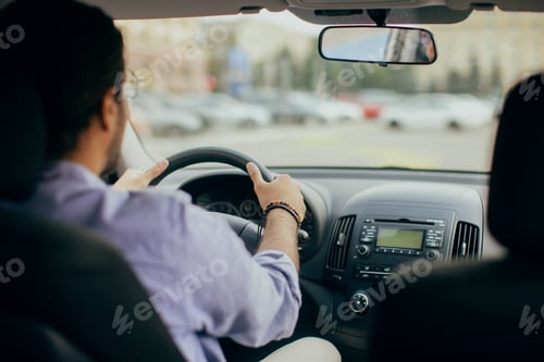 Preview: Rear view of indian man driving auto, copy space