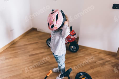 Preview: little girl wearing bicycle helmet