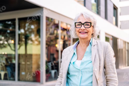 Preview: Smiling Senior Woman with Gray Hair outdoors