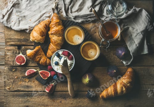 Preview: Breakfast with croissants, ricotta, figs, fresh berries, honey and espresso
