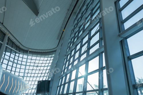 Preview: Beautiful modern design hall with windows at the airport in Abu Dhabi. Travel and check in