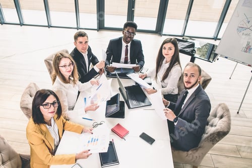 Preview: Multiethnical group of business people having a business meeting. Successful business team at the