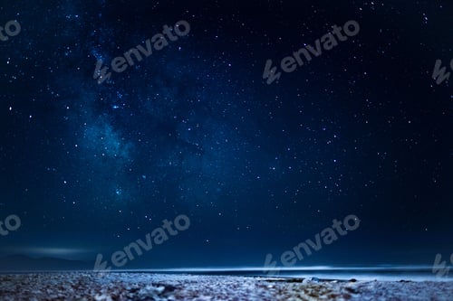Preview: View of the fantastic starry sky over the sea or ocean at night looking amazing