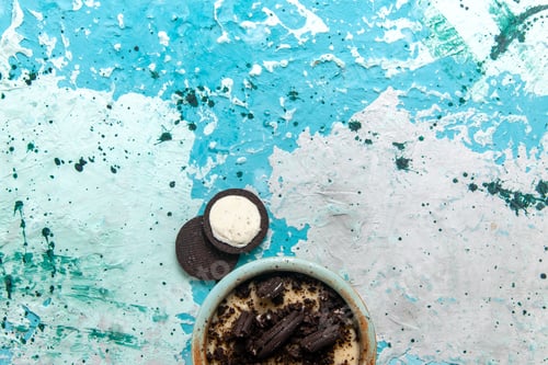 Preview: top view chocolate cookie dessert with cream and cookies on blue background cake dessert sugar sweet