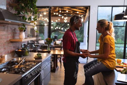 Preview: Caucasian couple spending time in the kitchen