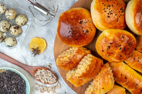 Preview: top view delicious buns with pastries fruits eggs and cereals on white background dough pie fruit