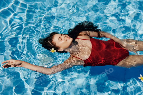 Preview: Woman pool summer blue water female lifestyle