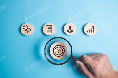 Preview: Magnifying glass with target business icons