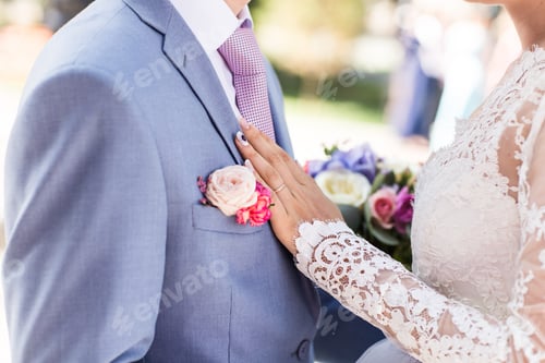 Preview: Stylish beautiful happy bride and groom, wedding celebrations outdoors
