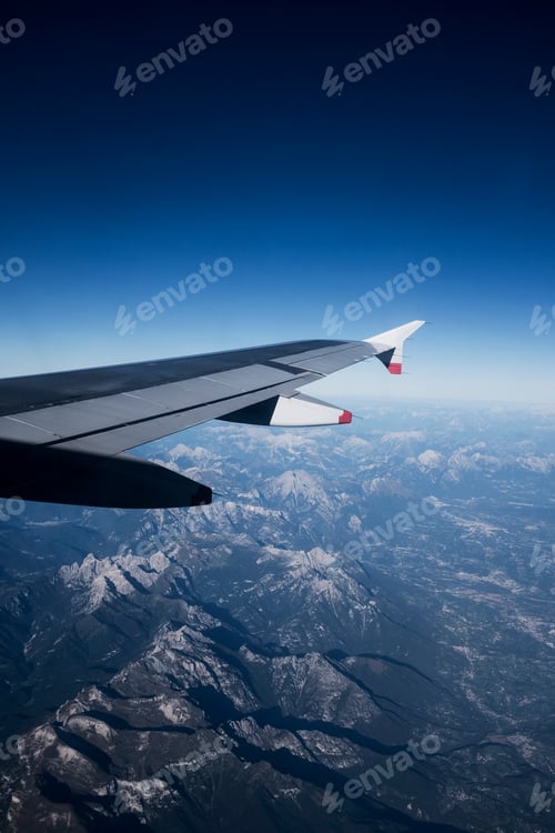 Preview: View across the Alps seen from a passenger plane window.