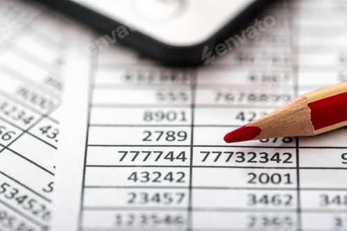 Preview: Closeup of a paper with calculations next to a red pencil
