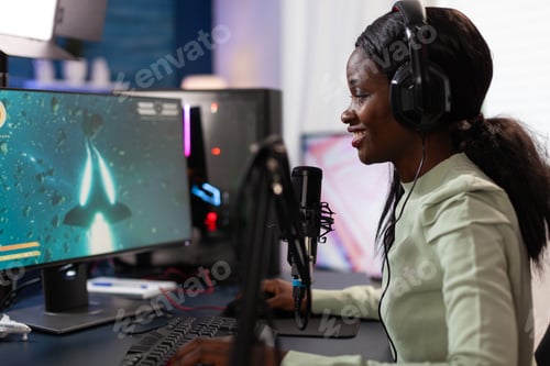 Preview: Competitive pro gamer woman talking into microphone