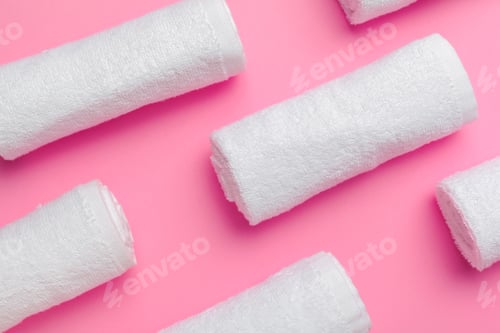 Preview: Clean towels on color background. creative photo.
