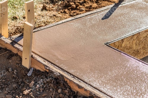 Preview: Fresh Pool Coping Cement Drying Within Wood Framing