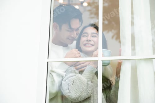 Preview: Young Asian Couple Enjoys Warm Coffee Together in Winter While Focusing on Wellness and Longevity