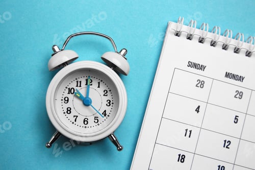 Preview: Alarm clock and calendar on light blue background, flat lay. Reminder concept