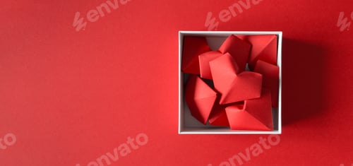 Preview: Origami heart in white gift box on red background