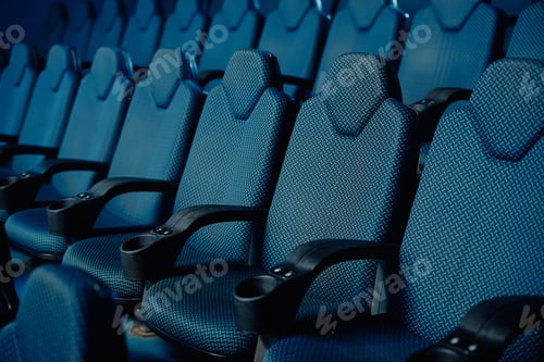 Preview: Seats in a movie theatre without people.