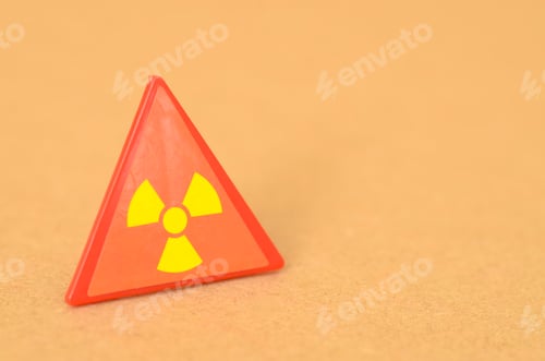 Preview: The caution sign clearly indicate a hazardous area due to the presence of radiation.