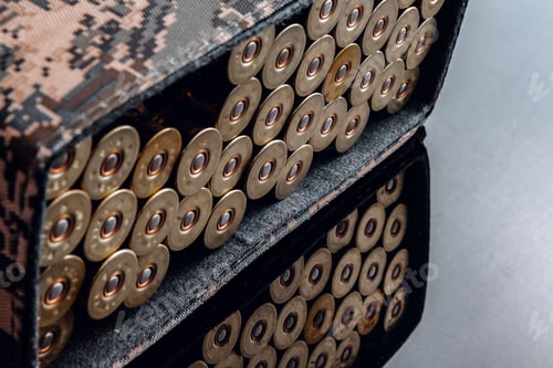 Preview: Pouch full of rifle cartridges on black backgorund