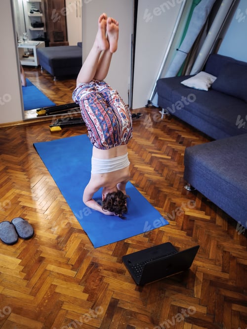 Preview: One Young Woman, Exercising Yoga At Home, In Room Using Yoga Mat.