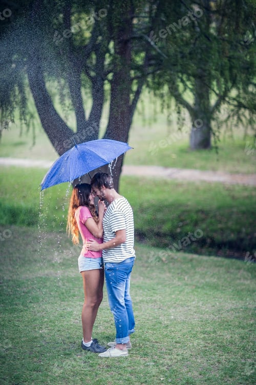 Preview: young people in the park on the raining day