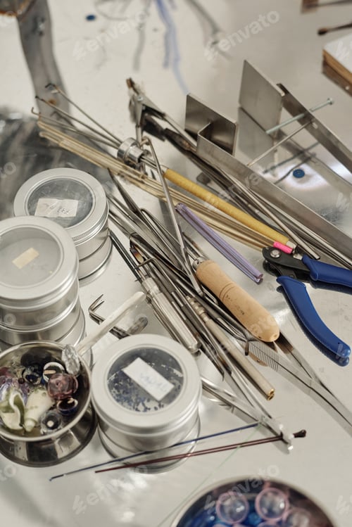 Preview: Handtools and supplies surrounded by all the necessary equipment for lampworking