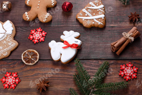 Preview: Christmas festive gingerbread made at home on a dark table