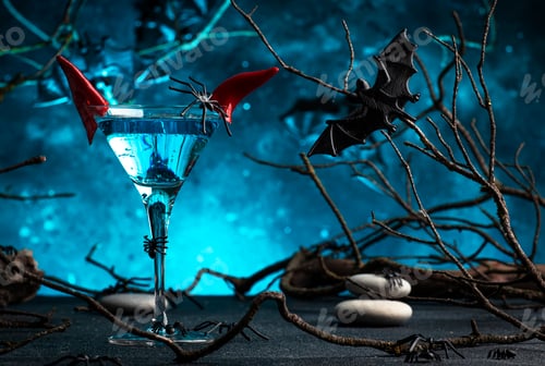 Preview: Halloween alcoholic cocktail evil martini on scary dark blue background