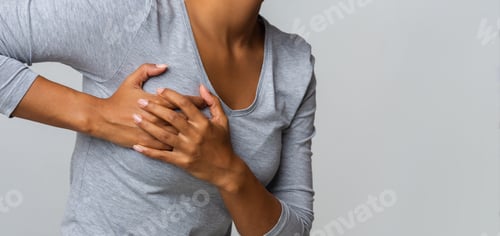 Preview: Young woman feel menstrual cyclic breast pain, touching her chest