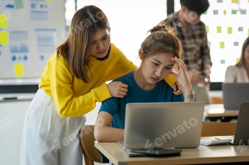 Preview: A group of young modern Asians is having a brainstorming meeting while sitting at work. Business mee