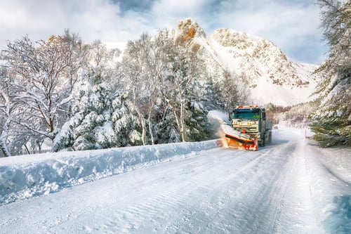 Preview: Winter scenery with snowplow truck clearing the road near Valberg