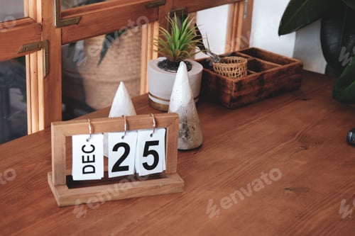 Preview: Calendar showing Christmas date on a table