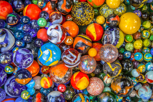 Preview: colorful glass marble multicultural community concept