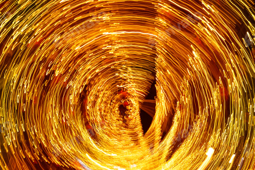 Preview: Bright abstraction from bokeh garland, Long exposure. Festive golden background