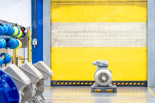 Preview: new modern electric motor on pallet in the warehouse on factory, copy space