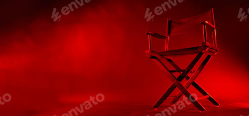 Preview: Director chair isolated in red light color with black background