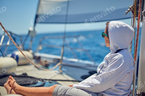 Preview: Young Woman Enjoying On A Sailing Boat.