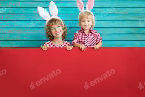 Preview: Happy Children with Easter Bunny Ears Holding Sign