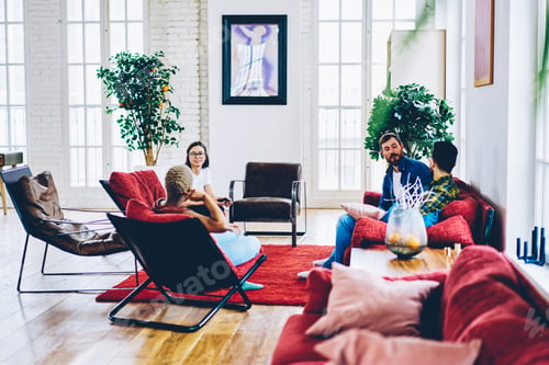 Preview: diversity young friends talking about flat decoration and homey hugge
