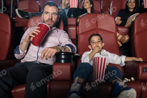 Preview: Father and son watching a movie