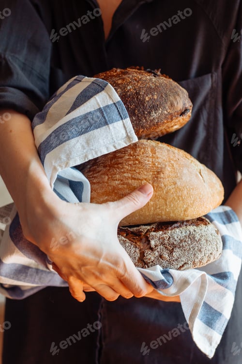 Preview: farmer's artisan bread in hand