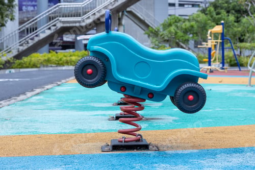 Preview: Colorful Playground with Slides and Swings in Park