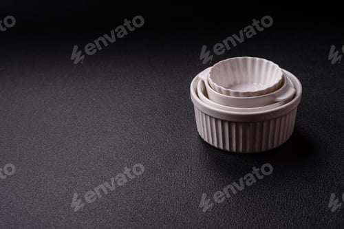 Preview: Beautiful empty white ceramic gravy boat on a concrete background
