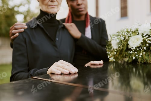Preview: Female Hands on Coffin