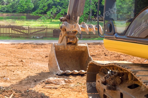 Preview: At a construction site, an excavator tractor equipment is being used