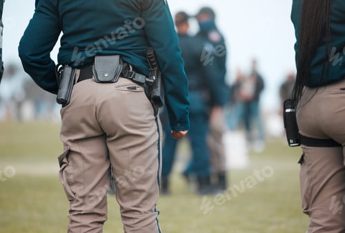 Preview: Cape Town, South African - October 2, 2021 Unrecognisable police officers monitoring a protest