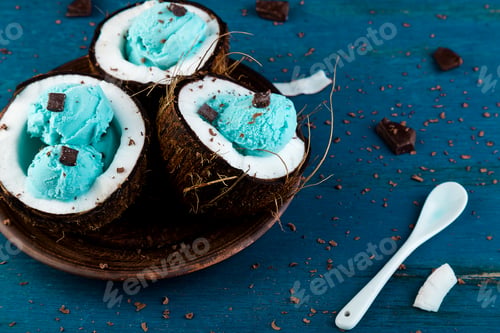 Preview: Blue ice cream in coconut bowl.