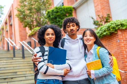 Preview: Portrait of three multi-ethnic university students embracing together
